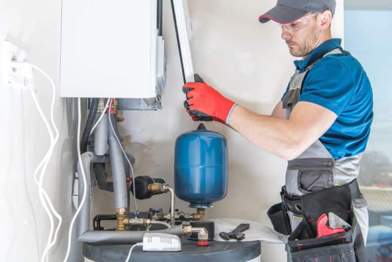 contractor installing a Gas Heater
